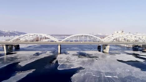 Aerial-view-of-the-Kiev-city,-Ukraine.-Dnieper-river-with-bridges.-Darnitskiy-bridge