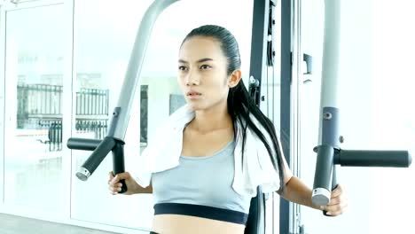 Asian-woman-Exercise-at-gym.-Sport-and-Reaction-concept.-4k-Resolution.