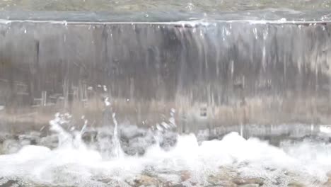 Cascade-waterfall-fountain.-Water-flows-on-the-steps.