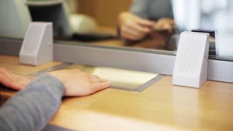 clerk-counting-money-and-customer-at-bank-office