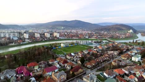 Aerial-footage-of-Mukachevo-city-center---top-view-at-sunset-time