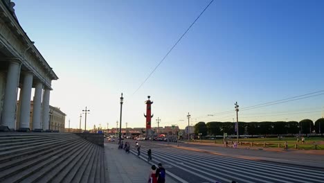 Time-lapse-of-a-traffic-transport-moving-on-Old-Saint-Petersburg-Stock-Exchange-and-Rostral-Columns-in-St.-Petersburg