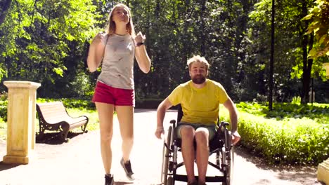 Portrait-of-happy-young-disable-man-on-a-walk-in-the-park