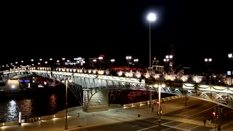 Patriarshy-Bridge---is-a-steel-pedestrian-box-girder-bridge-that-spans-Moskva-River-near-the-Cathedral-of-Christ-the-Saviour-in-downtown-Moscow,-Russia