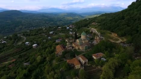 Caucasus-green-hills-with-famous-ancient-Bagrati-Cathedral,-Kutaisi-sightseeing