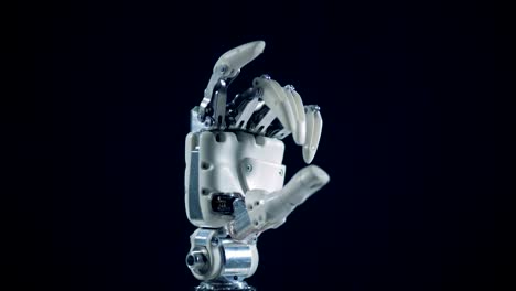 Fist-of-a-robotic-hand-is-moving-its-fingers