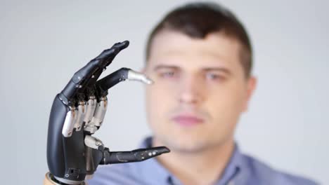 Man-with-Robotic-Prosthetic-Hand