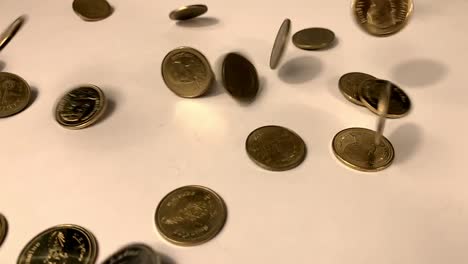 Coins-in-falling-in-slow-motion.