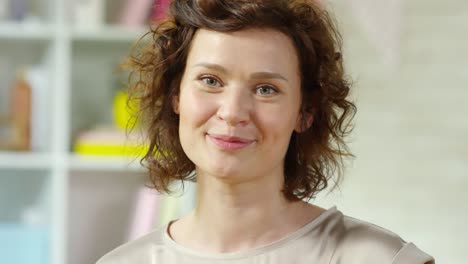 Portrait-of-Happy-Woman-Smiling-and-Holding-Easter-Eggs