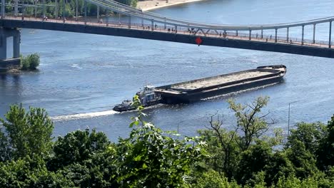 Barge-floats-on-the-Dnipro-river-in-Kyiv