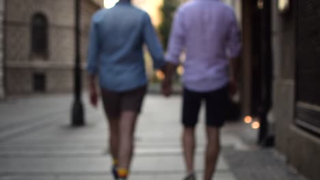 Gay-couple-exploring-a-city-in-Europe