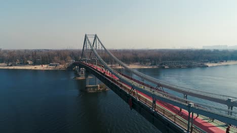 Marathon-running-on-the-footbridge.-Dolly-shot