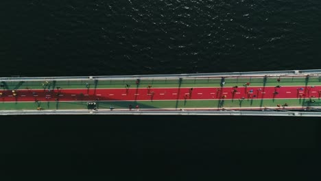 Marathon-running-on-the-footbridge.-Top-view-shot