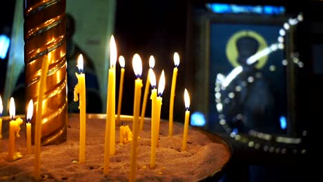 burning-candles-in-the-Church-in-the-temple