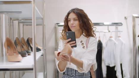 Customer-Making-Photos-of-Shoes-in-Shoe-Shop