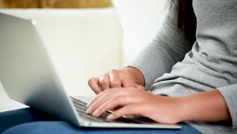 Asian-woman-using-tablet-computer-shopping-online-website-on-smartphone-with-smiling-face.-Happiness-asian-woman-holding-cellphone-checking-mail-from-online-shopping-website-read-article-Blog-vlog-social-media