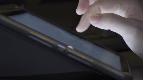 4K-Video-close-up-finger-touch-on-tablet-screen.