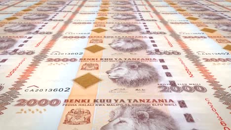 Banknotes-of-two-thousand-Tanzanian-shilling-of-Tanzania,-cash-money,-loop