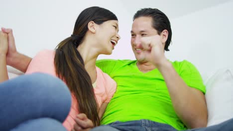 Asian-Chinese-male-female-social-networking-home-couch