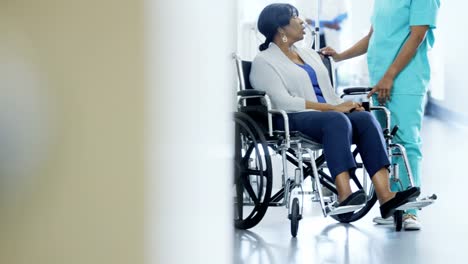 African-American-female-doctor-and-patient-in-wheelchair