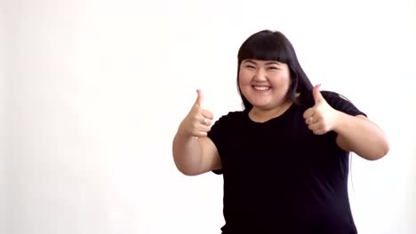 young-beautiful-overweight-Asian-girl-on-white-background-smiling.-Happy-Authentic-woman