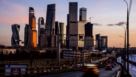 view-of-the-skyscrapers-and-towers-of-downtown-at-sunset,-time-lapse