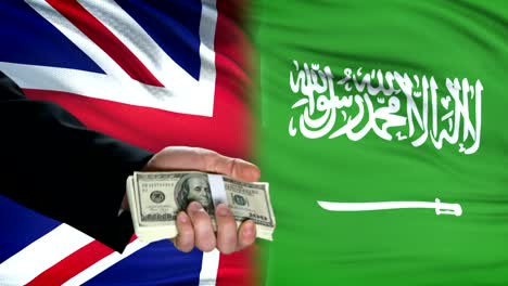 Großbritannien-und-Saudi-Arabien-Beamte-austauschen-Tankgeld,-Flagge-Hintergrund