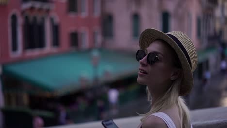 Slow-motion-effect-of-attractive-caucasian-female-traveller-enjoying-time-for-exploring-italian-city-walking-on-urban-setting