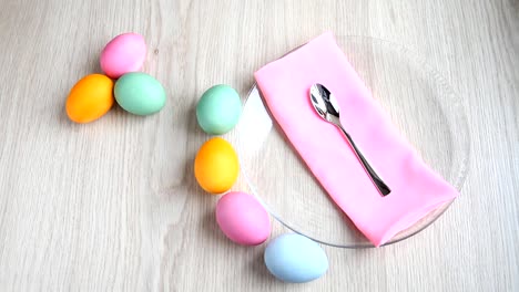 Lay-out-beautifully-colored-Easter-eggs-on-the-table.