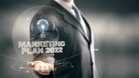 Marketingplan-2022-mit-Glühbirne-Hologramm-Geschäftsmann-Konzept