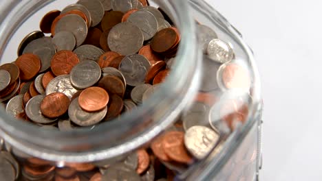 Looking-into-Clear-Jar-with-Coins