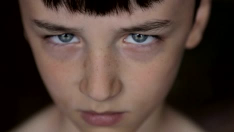 Child-portrait,-boy-looks-at-the-camera