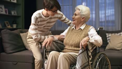 Adult-Granddaughter-Posing-with-Grandmother-in-Wheelchair