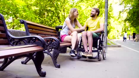 Young-disable-man-with-his-wife-in-the-park