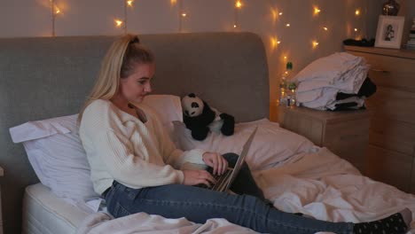 Young-Woman-Using-Laptop-at-Home