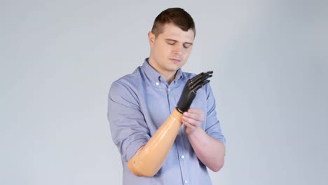 Amputee-Man-Putting-on-Prosthetic-Arm