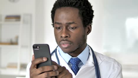 African-Doctor-Using-Smartphone