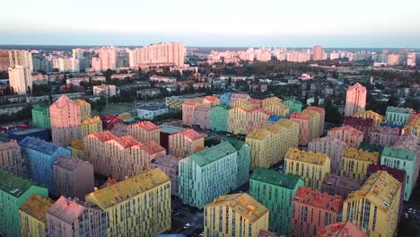 Top-view-aerial-footage-of-Comfort-Town.-Colorful-buildings-in-Kiev,-Ukraine