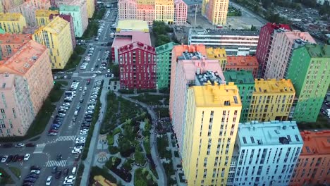 top-view-of-a-cozy-colorful-district,-colorful-houses-and-roads-filled-with-cars,-Comfort-Town-in-Kiev,-Ukraine