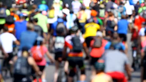 Group-of-cyclists-riding-the-road