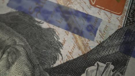 Billete-de-papel-americano-de-cien-dólares-en-macro-vista-de-cerca-tiro-de-muñeca.