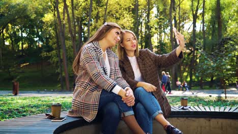 Beautiful-bloggers-live-streaming-using-smartphone-in-public-park