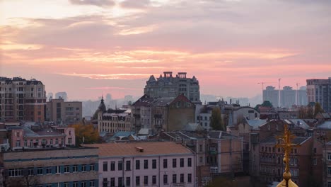 Aerial-view-of-Kyiv-city-at-sunset,-Ukraine.-Panoramic-cityscape,-4k-time-lapse