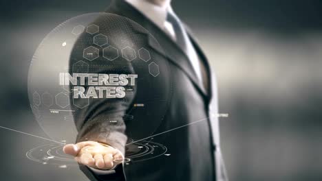 Interest-Rates-with-hologram-businessman-concept