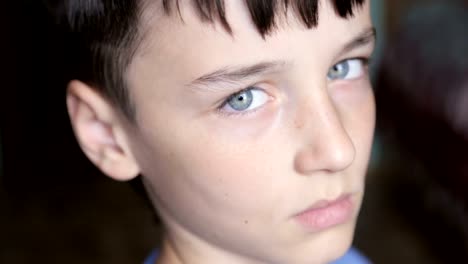 Child-portrait,-boy-looks-at-the-camera