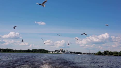 river-travel-by-boat-on-Kostroma,-Russia.-video-taken-from-aboard-sailing-boat