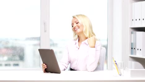 businesswoman-or-student-with-tablet-pc-computer-at-office