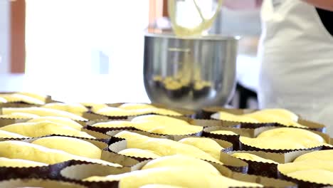 pastry-chef-hands-icing-dough-for-Easter-cake-doves