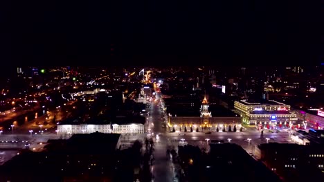 Vista-aérea-en-la-ciudad-de-noche-con-luces.-Vista-panorámica-de-la-ciudad-grande-bonita-en-la-noche