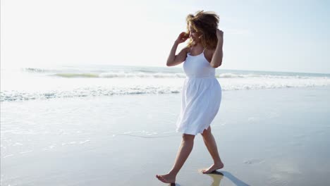 Plus-size-Ethnic-female-enjoying-summer-at-beach